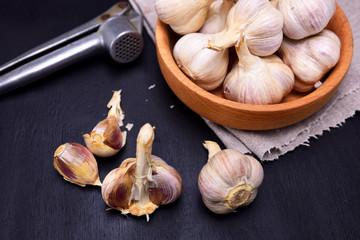  garlic in a wooden bowl