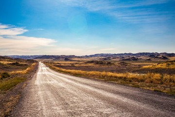 long lonely old asphalt road