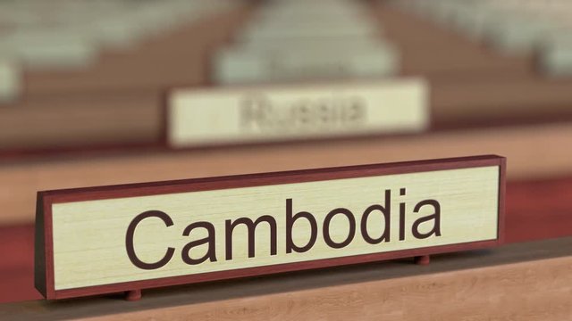 Cambodia name sign among different countries plaques at international organization. 3D rendering