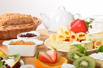 White and yellow cheese with green pepper