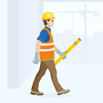 A Man Is A Construction Worker In Overalls In The Workplace With A Tool In His Hands. Vector Illustration.