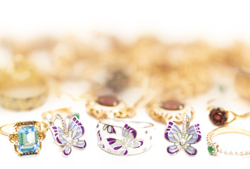 Gold jewelry with enamel and precious stones