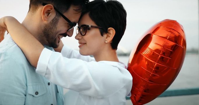 Young couple in love dating and smiling outdoor