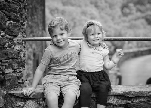 Lovely Adorable Brother And Sister Giving Each Other A Hug For Family Love