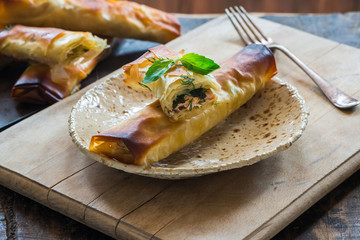Salmon and basil butter filo parcels