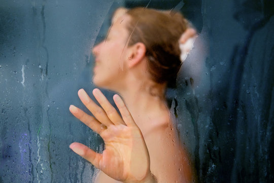 blurred image of a girl taking a shower