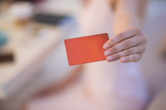 Close-up Red Card Which Woman Keeps In Hand