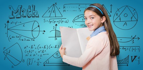 Composite image of portrait of smiling girl holding book