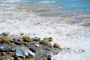 Waves and tyrrhenian sea on the shore, beautiful landscape at Piombino, Salivoli, Italy