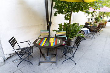 Outdoor cafe with a colorful table