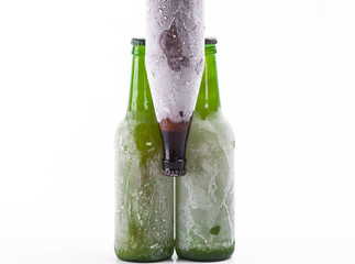Three bottles of beer on white isolated background
