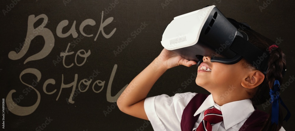 Poster composite image of close-up of schoolgirl using virtual reality