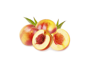 Peaches (nectarine) isolated on white background. Peaches with leaves.