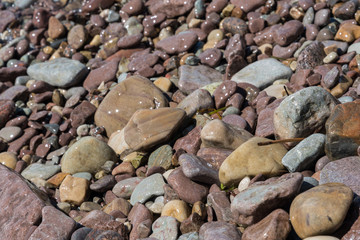Wet pebbles by the coast