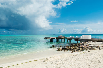 Chill lounge zone on the sandy beach, Maldives island