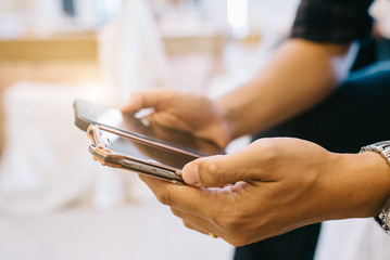 Obraz premium Businessman using smart phone for business concept