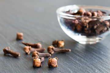 Dry cloves (spice) on a dark background