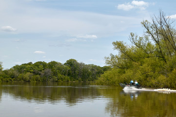 Motorboat with fishermen on Altamaha River, USA