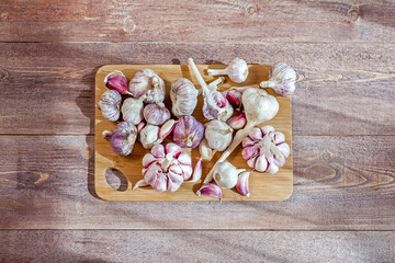 Garlic. Garlic Cloves and Garlic Bulb on a wooden vintage rustic table. Top View