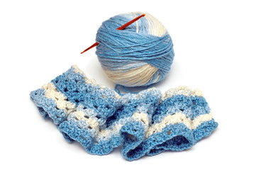 Wool knitting ball and crochet hook isolated on white background. Handmade. Threads knitting a scarf, sweaters, hats and other. Flat lay, top view