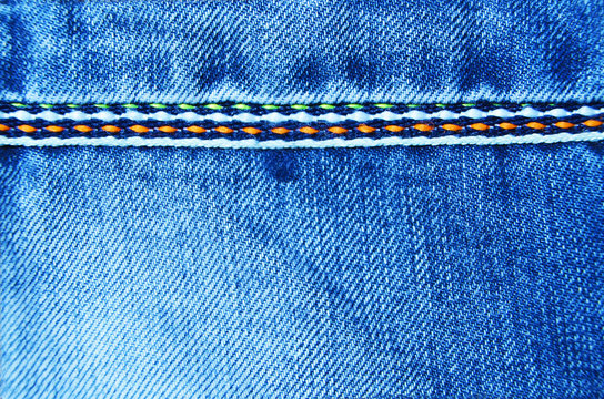 Blue Jeans Cloth With Seam Background Texture Vignette.