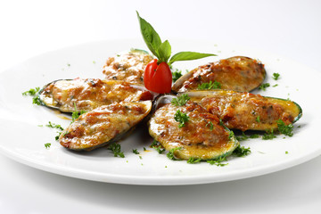 Baked New Zealand Mussels Six Pieces with Cheese on White Circle Dish, Isolated on White Background with Shadow. Close-up Low Angle Side View, Selective Focus at Food.
