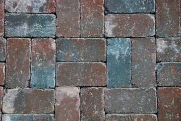 коричнево серый тёртый фон из кирпичей стены частного дома