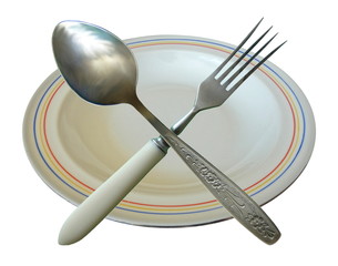 Fork and Spoon Crossed in Plate Isolated
