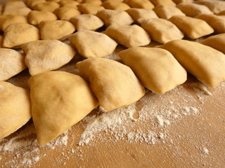 Pierogi Dumplings On Pastry Board