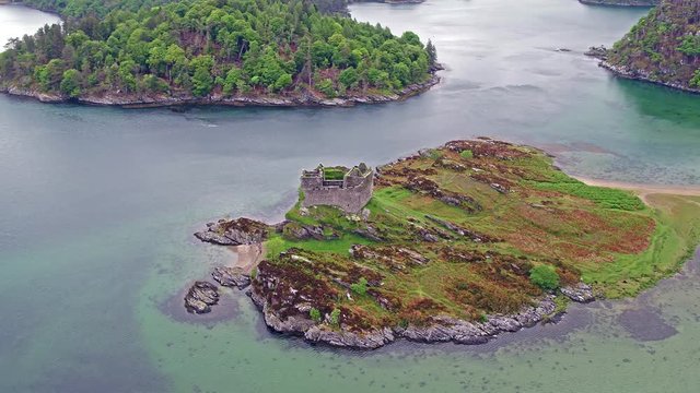 Aerial view of the old ruined Castle in the Highlands of Scotland