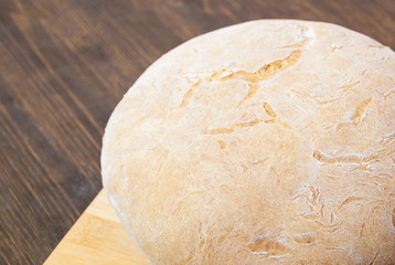 The bake fresh bread at home. Fresh, crusty bread. Natural product.