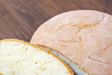 The bake fresh bread at home. Fresh, crusty bread. Natural product.