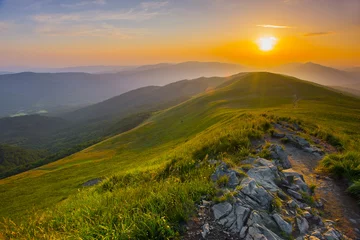 Foto op Canvas Zonsondergang in de bergen © Piotr Krzeslak