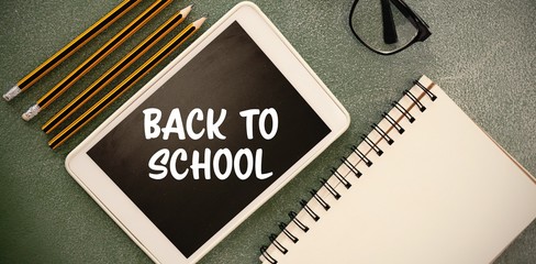 Composite image of back to school text on white background