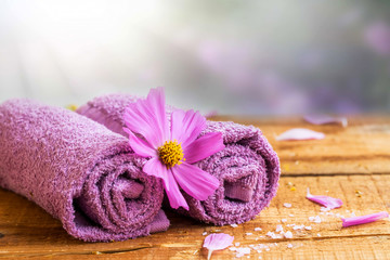 Obraz na płótnie Canvas Spa still life with towels and flower