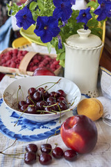 Cherry and other fruits in the background