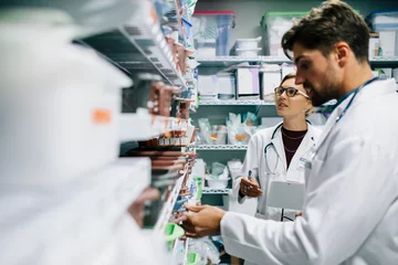 Acrylic prints Pharmacy Pharmacists checking inventory at hospital pharmacy