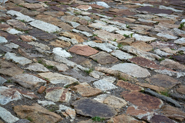 Fragment of an old cobblestone road