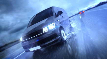 Fast Van driving through the Rain on wet Road at Night