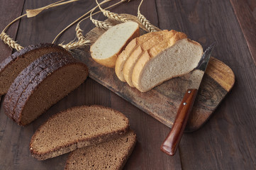Fresh bread on wooden table