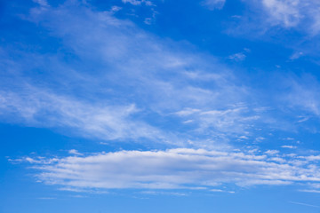 Naklejka na ściany i meble the beautiful blue sky with clouds background. Sky clouds. Sky with clouds weather nature cloud blue. Blue sky with clouds and sun.