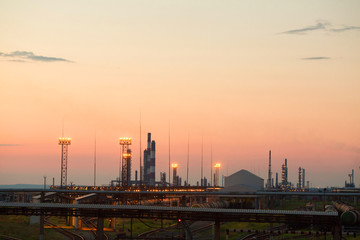 Industrial plant in the evening against the sunset