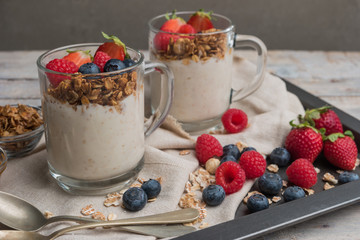 Breakfast parfait with homemade granola, fresh fruits and yogurt