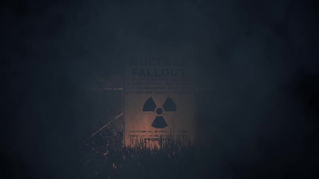 Nuclear Fallout Warning Sign on a Fence in a Storm