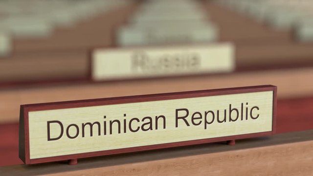 Dominican Republic name sign among different countries plaques at international organization. 3D rendering