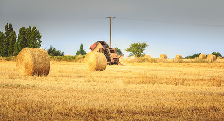 Remains of a round baler after a fire © Pierre-Olivier