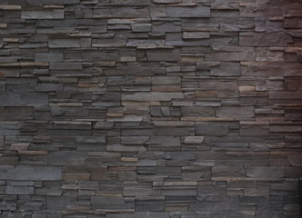 the walls are decorated with stone tiling