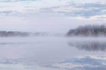 Calm foggy lake scape summer night