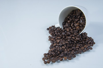 Coffee cup with coffee beans