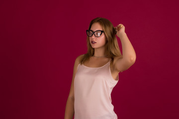 Young cute girl with comb, studio  